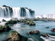 waterfalls under clear sky during daytime digital wallpaper